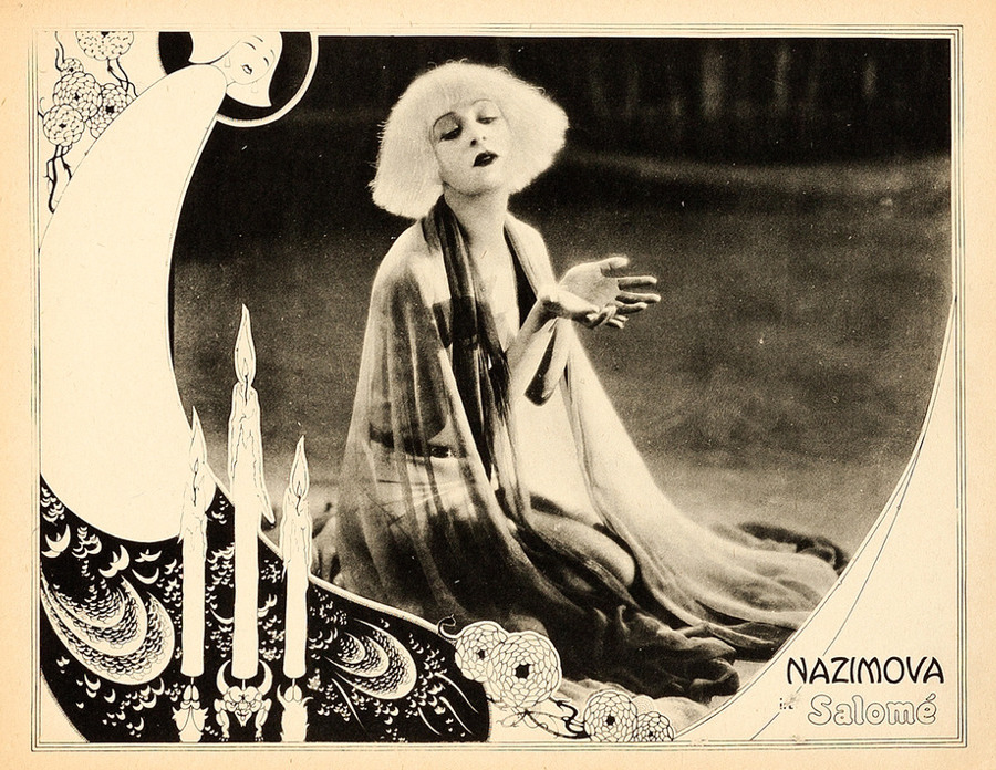 Alla Nazimova in a vintage Salomé publicity card, surrounded by elaborate black-and-white ornament.
